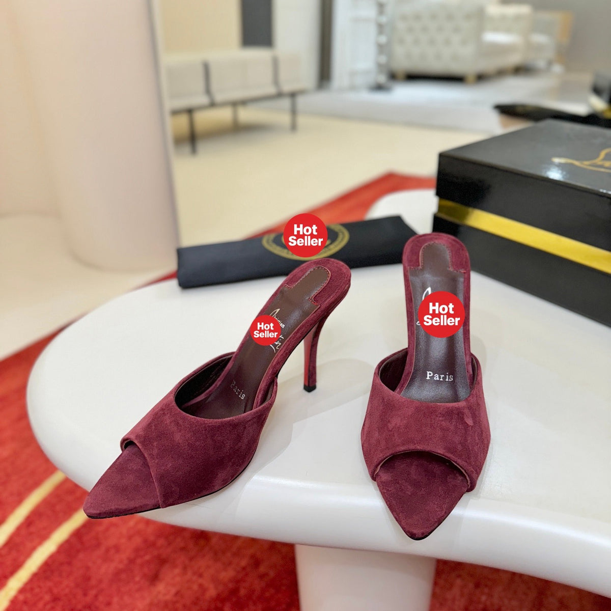 Red pointed-toe high-heeled mules, 10cm heel.