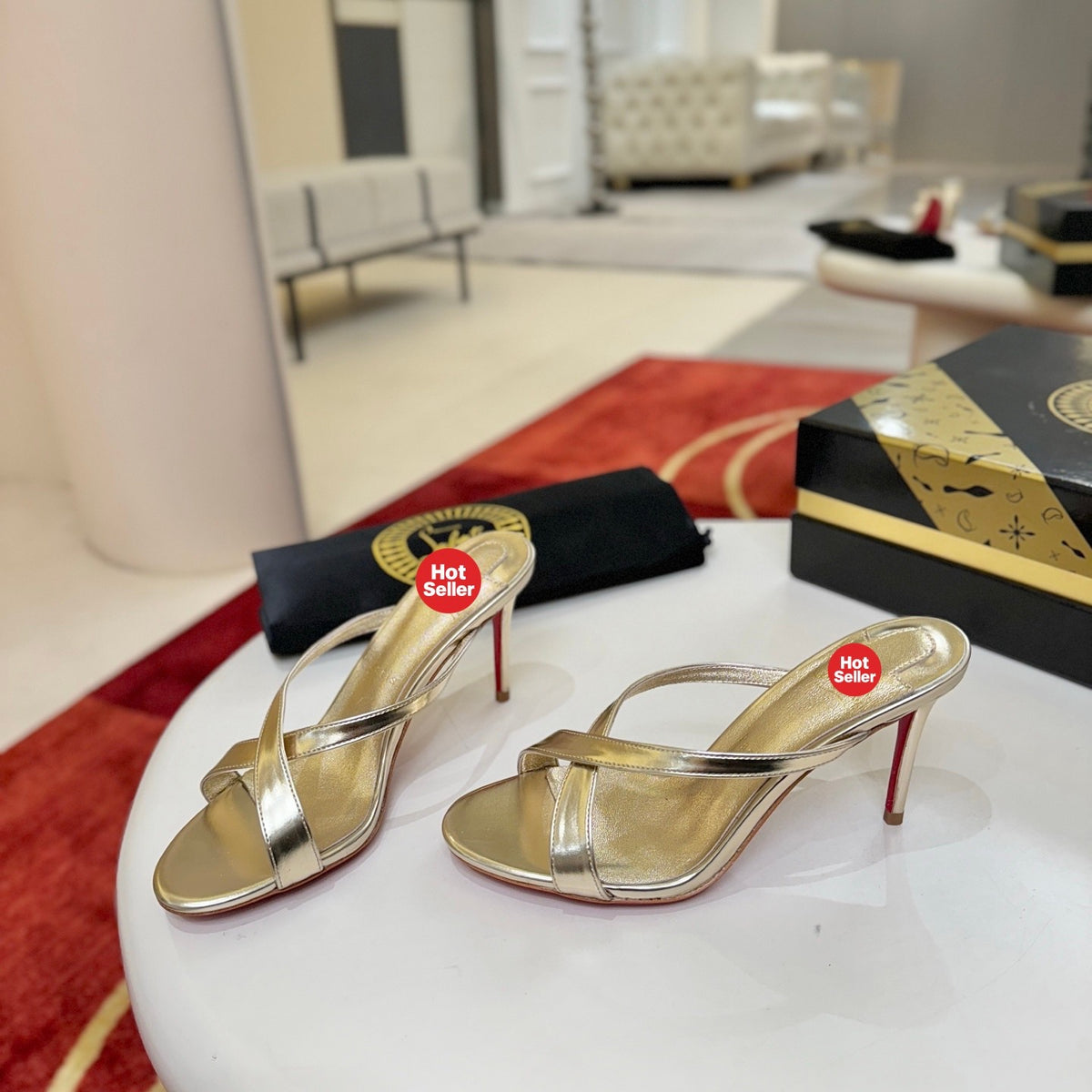 Criss-cross high-heeled mules