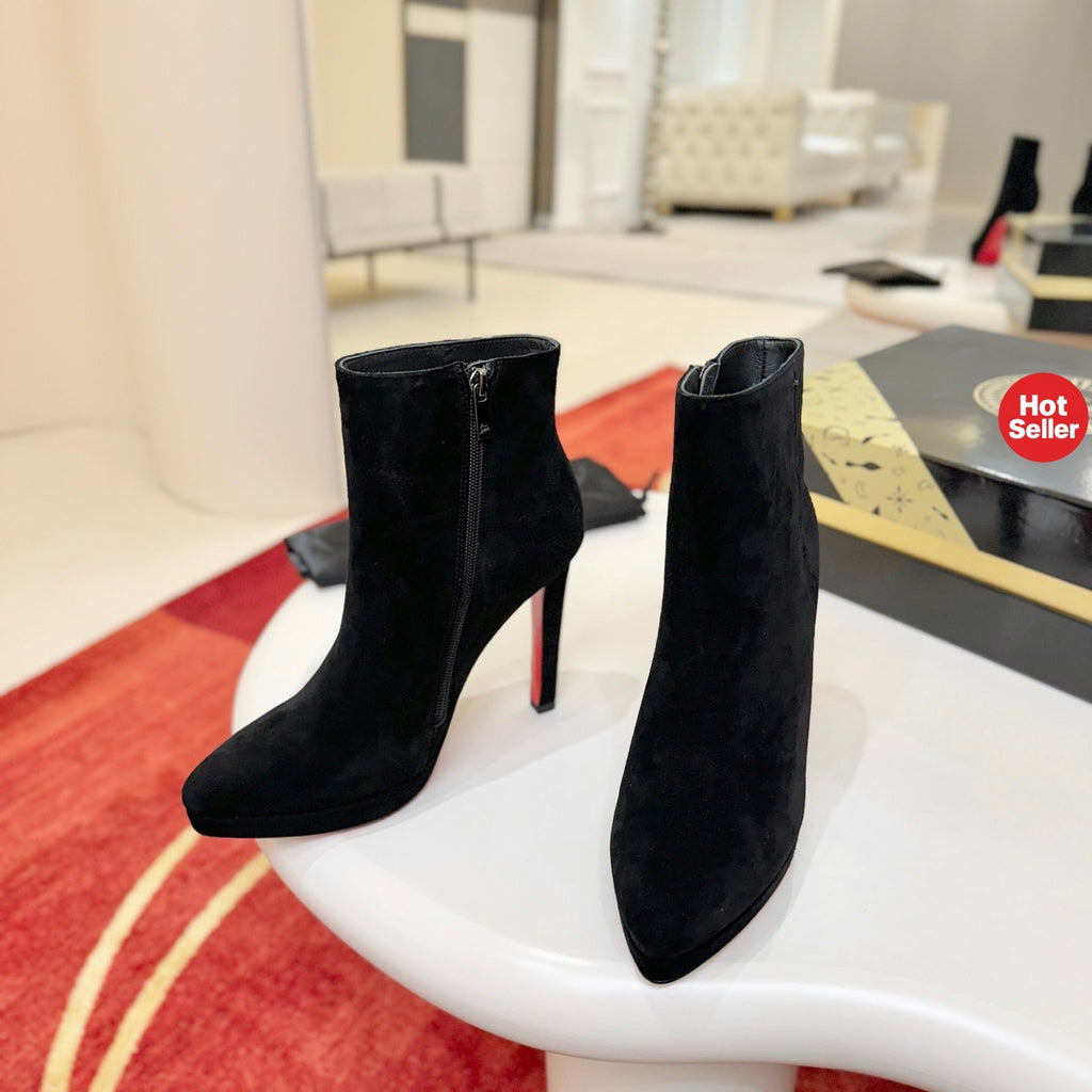 Black suede stiletto ankle boots, 12cm heel.