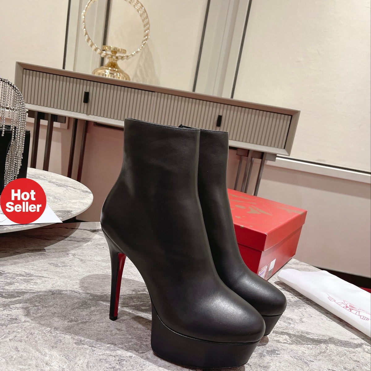 Black Nappa leather ankle boots featuring a soaring 12cm height. Heel: 13cm.