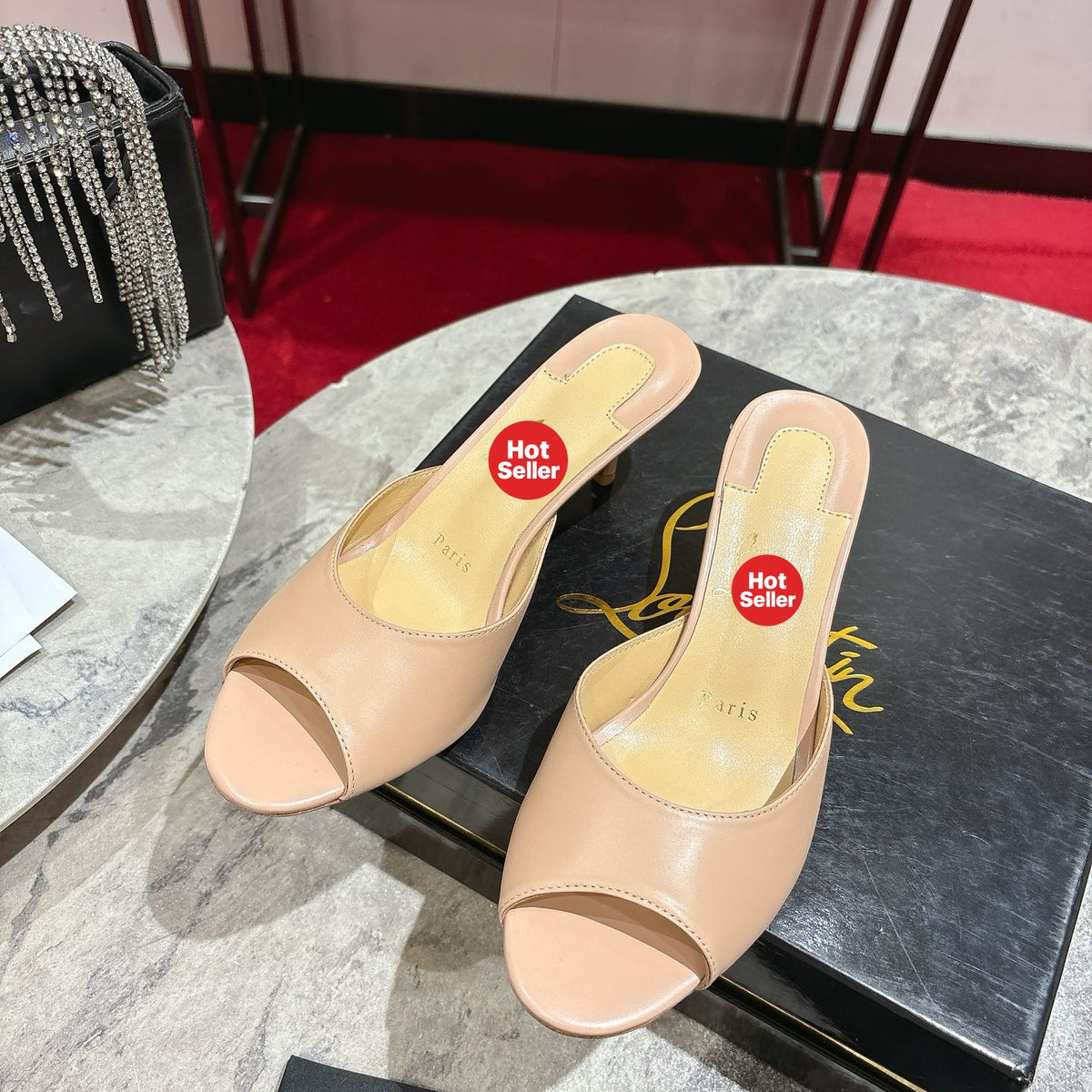 Apricot high-heeled mules, 8.5cm heel.