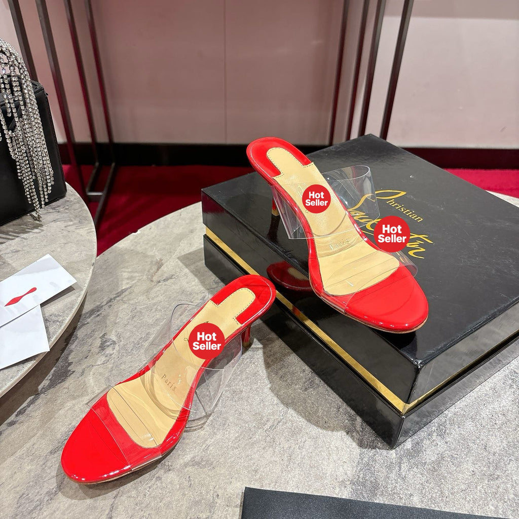 Red translucent high-heeled mules, 8.5cm heel.