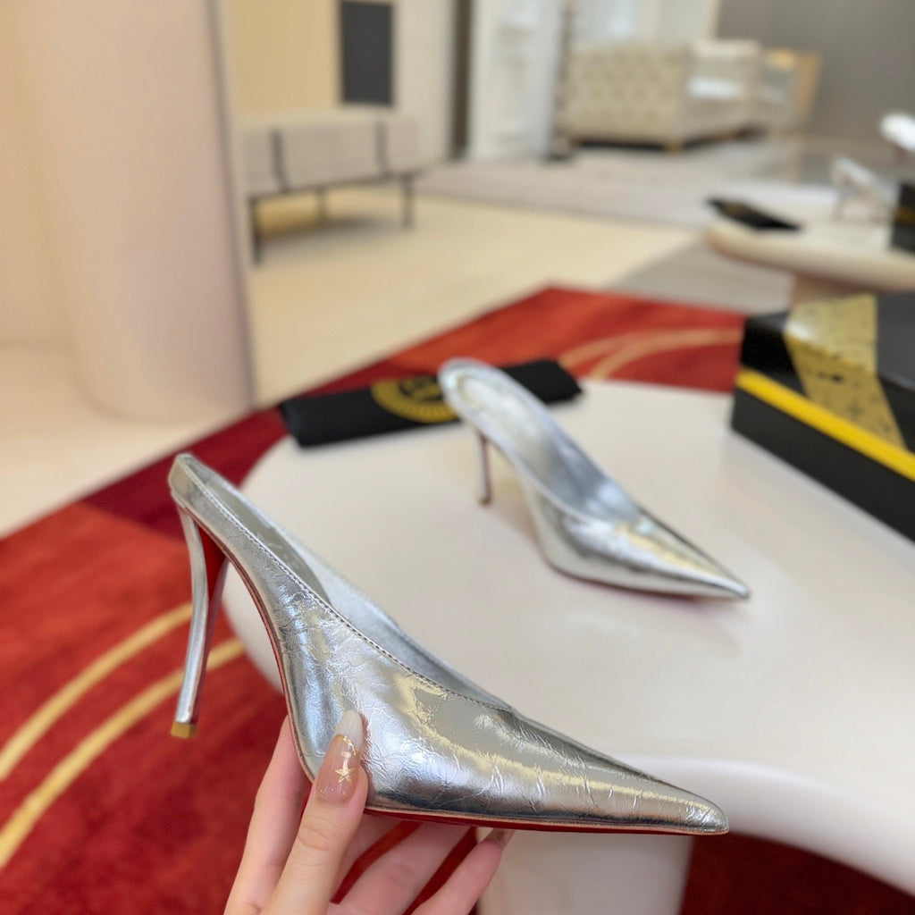 Silver leather high-heeled mules, 10cm heel.