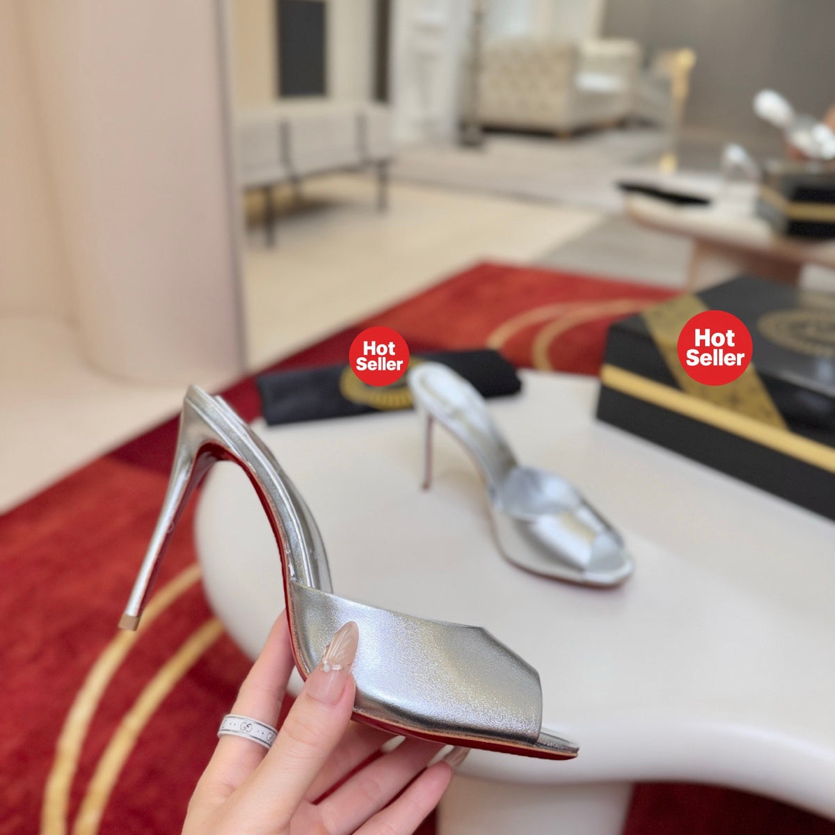Silver peep-toe high-heeled mules, 10cm heel.