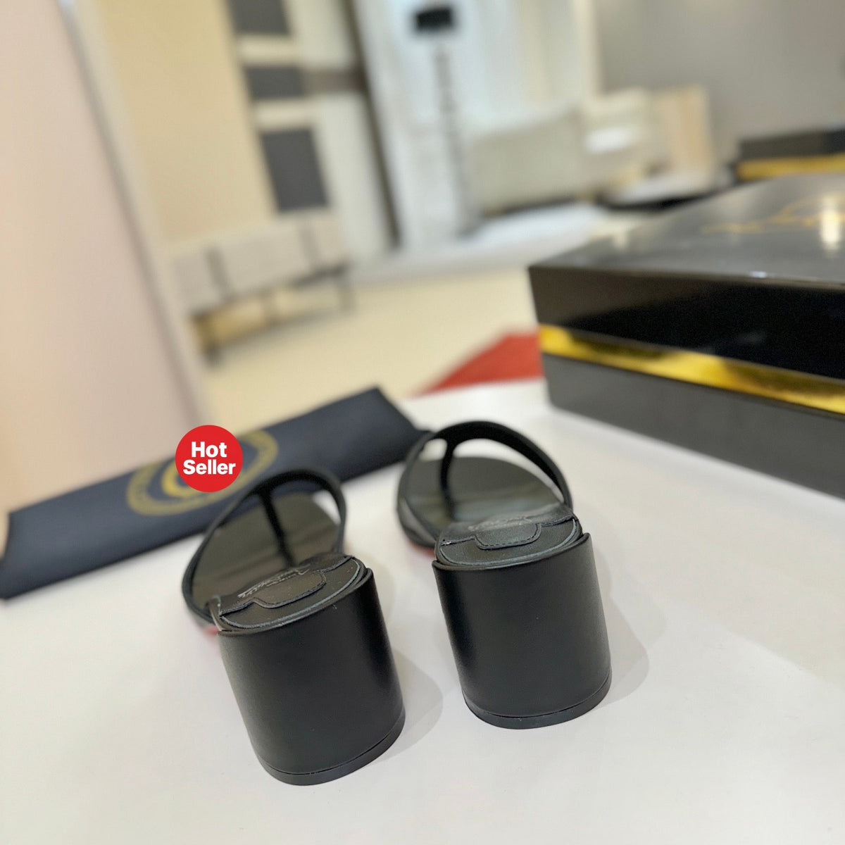 Black flip-flops, 5.5cm heel.