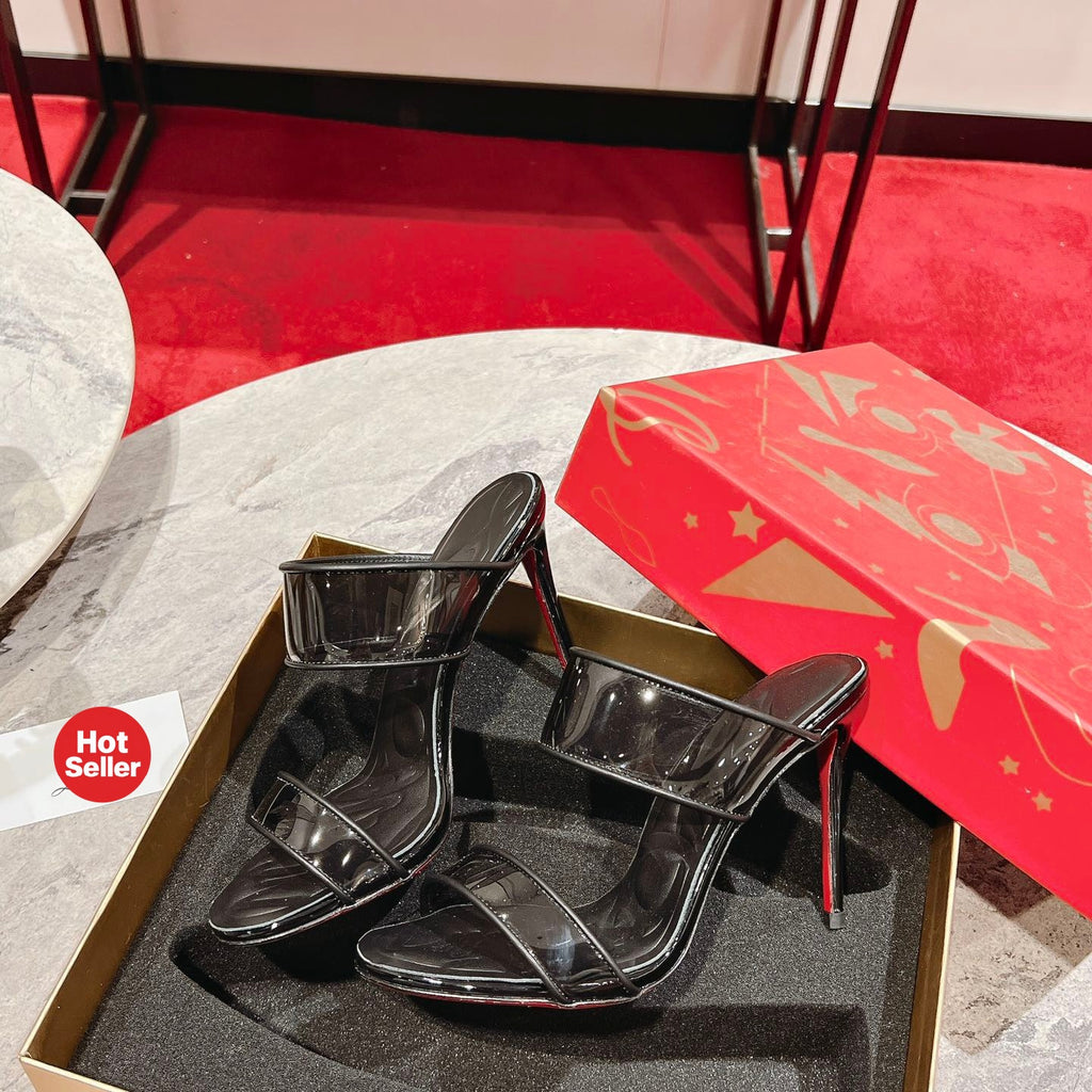 Black high-heeled mules, 10cm heel.