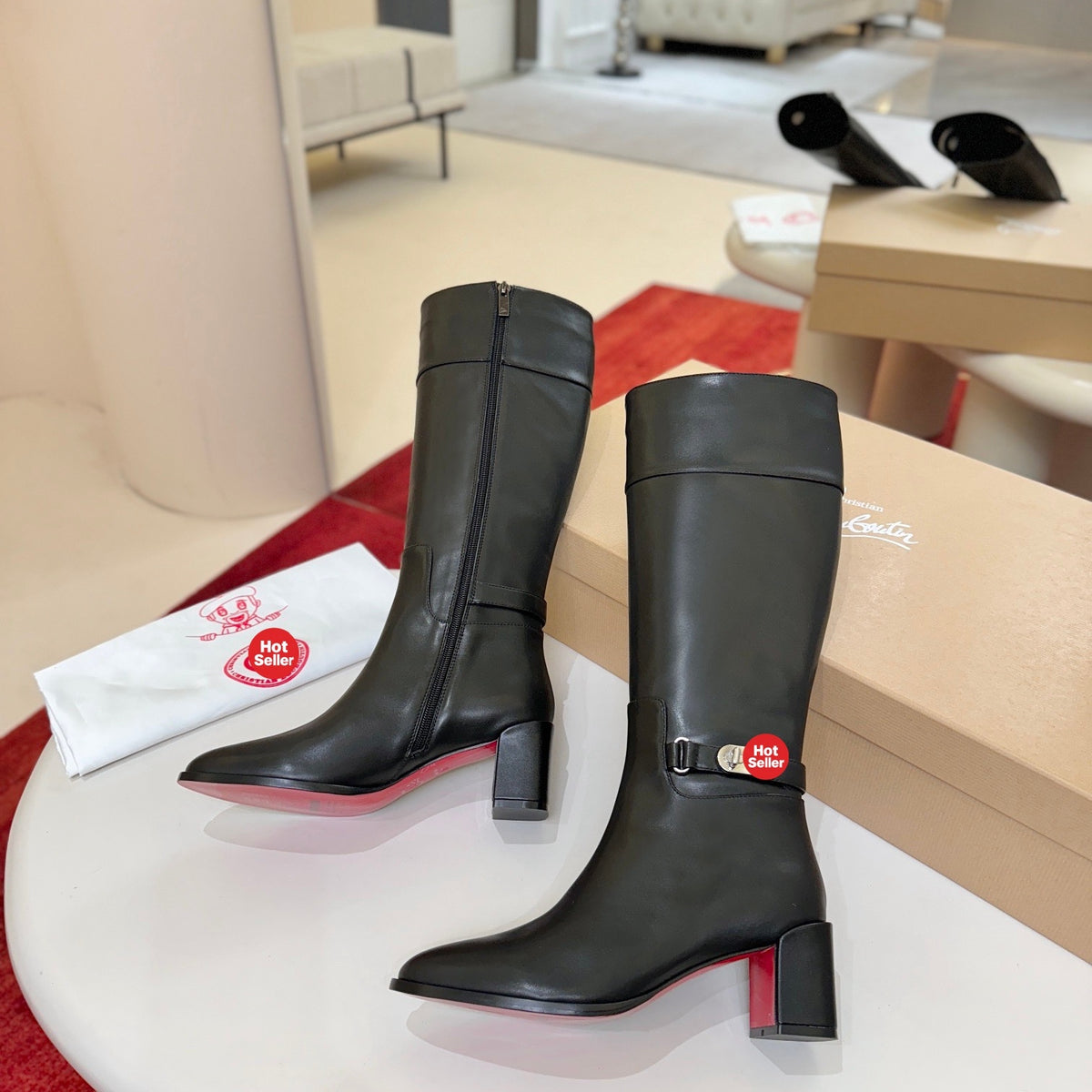 Distinctive premium black leather tall boots; 6.5cm heel.