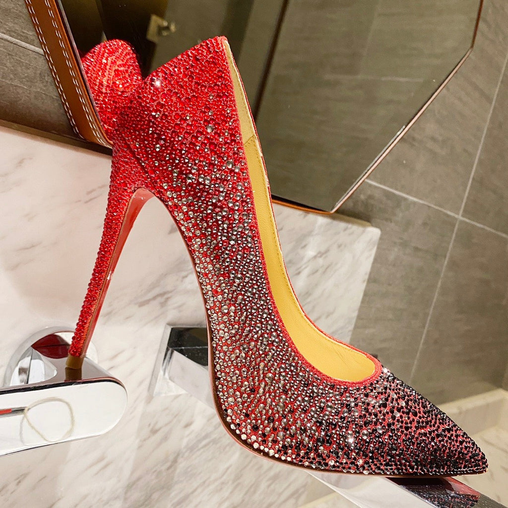 Bright red fully rhinestone-encrusted high heels, 10cm heel.