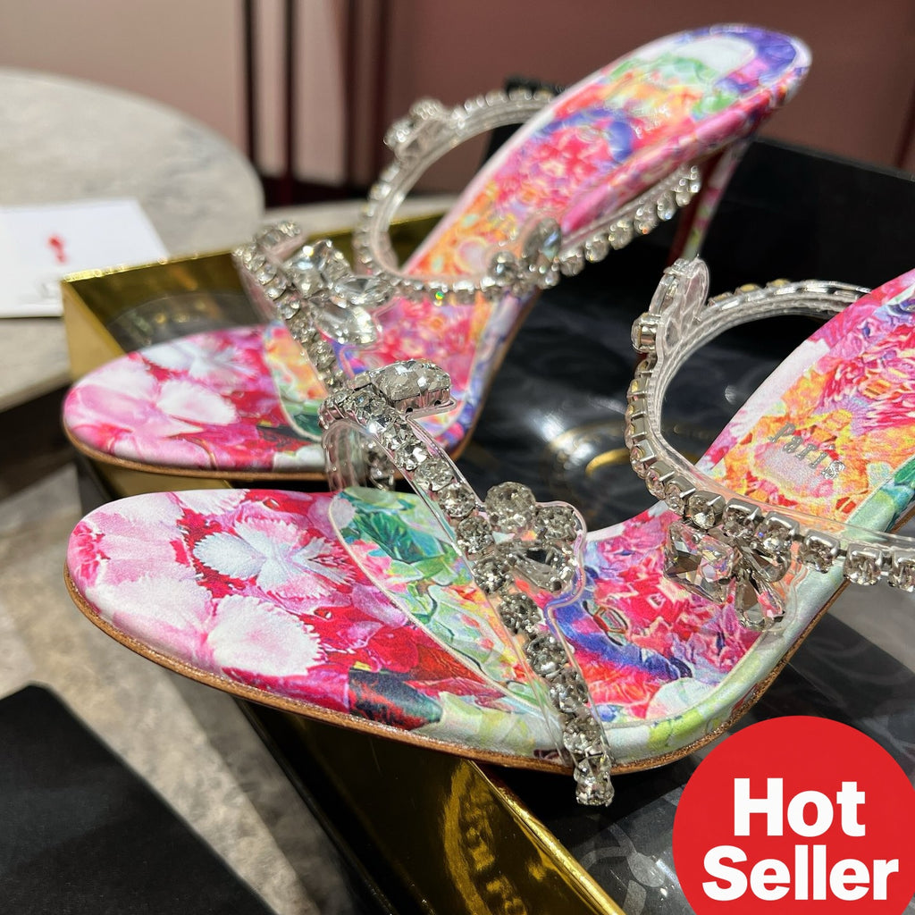 High-heeled mules with a distinctive print; 10cm heel.