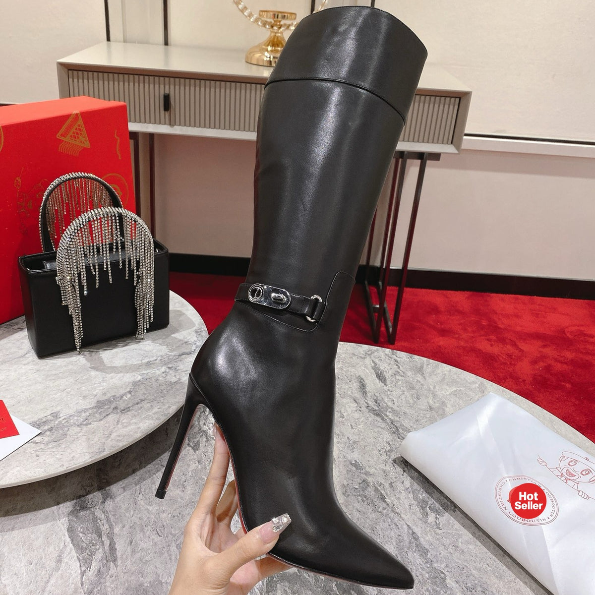 Black calfskin high-shaft boots, 10cm heel.