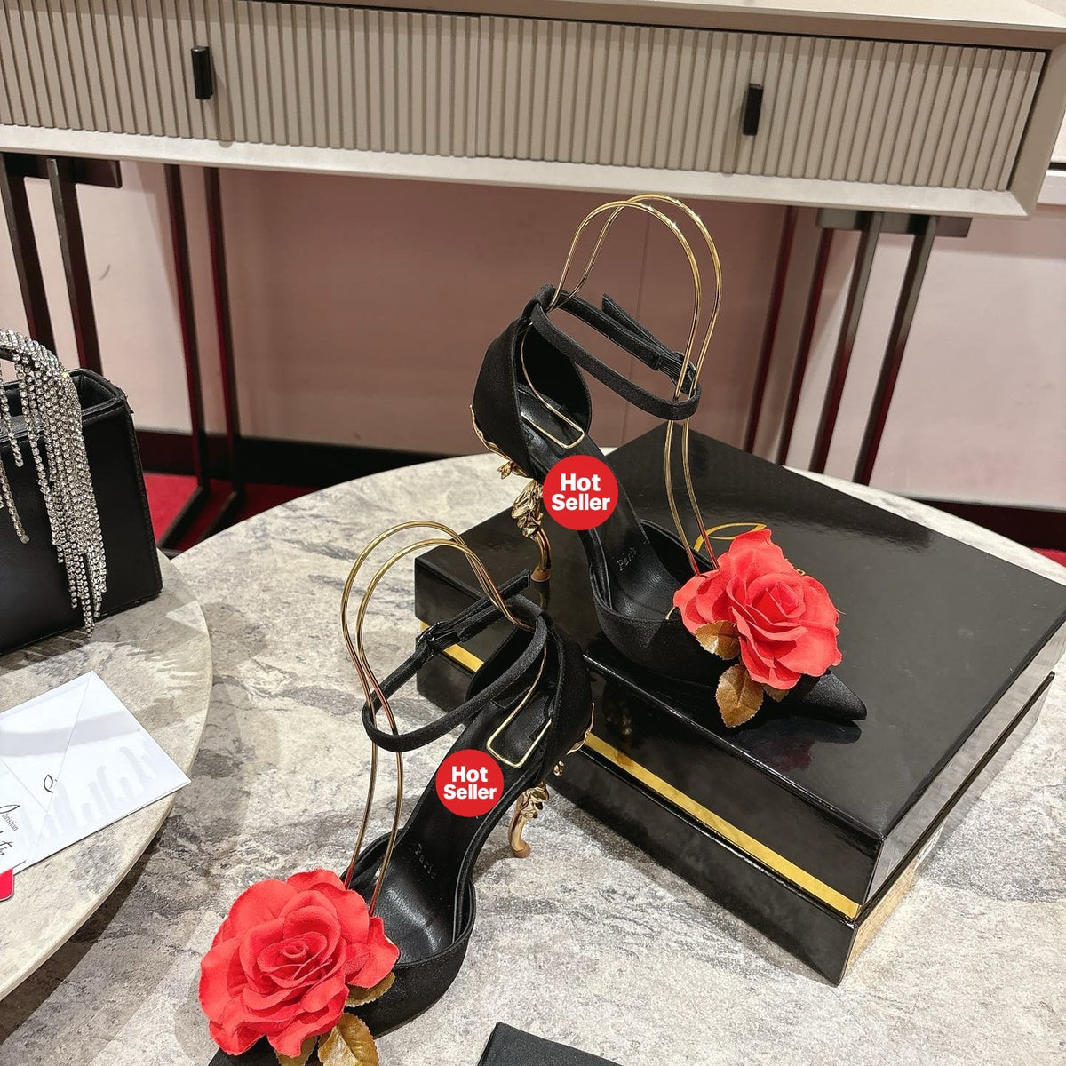 High-heeled shoes featuring a rose design; 10cm heel.