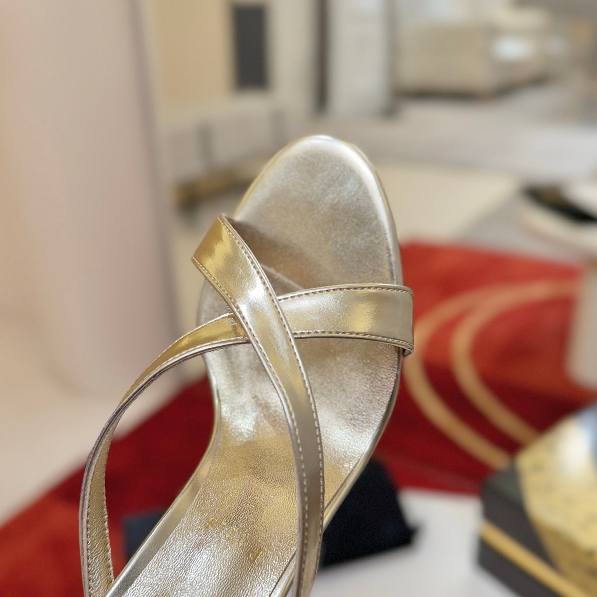 Criss-cross high-heeled mules