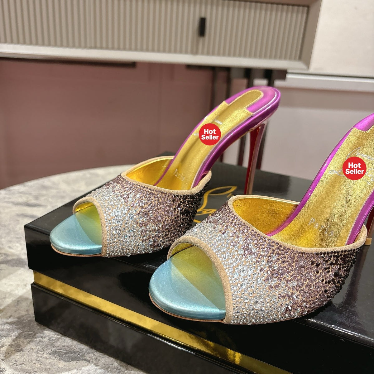 Peep-toe high-heeled slides with colorful rhinestones; 10cm heel.