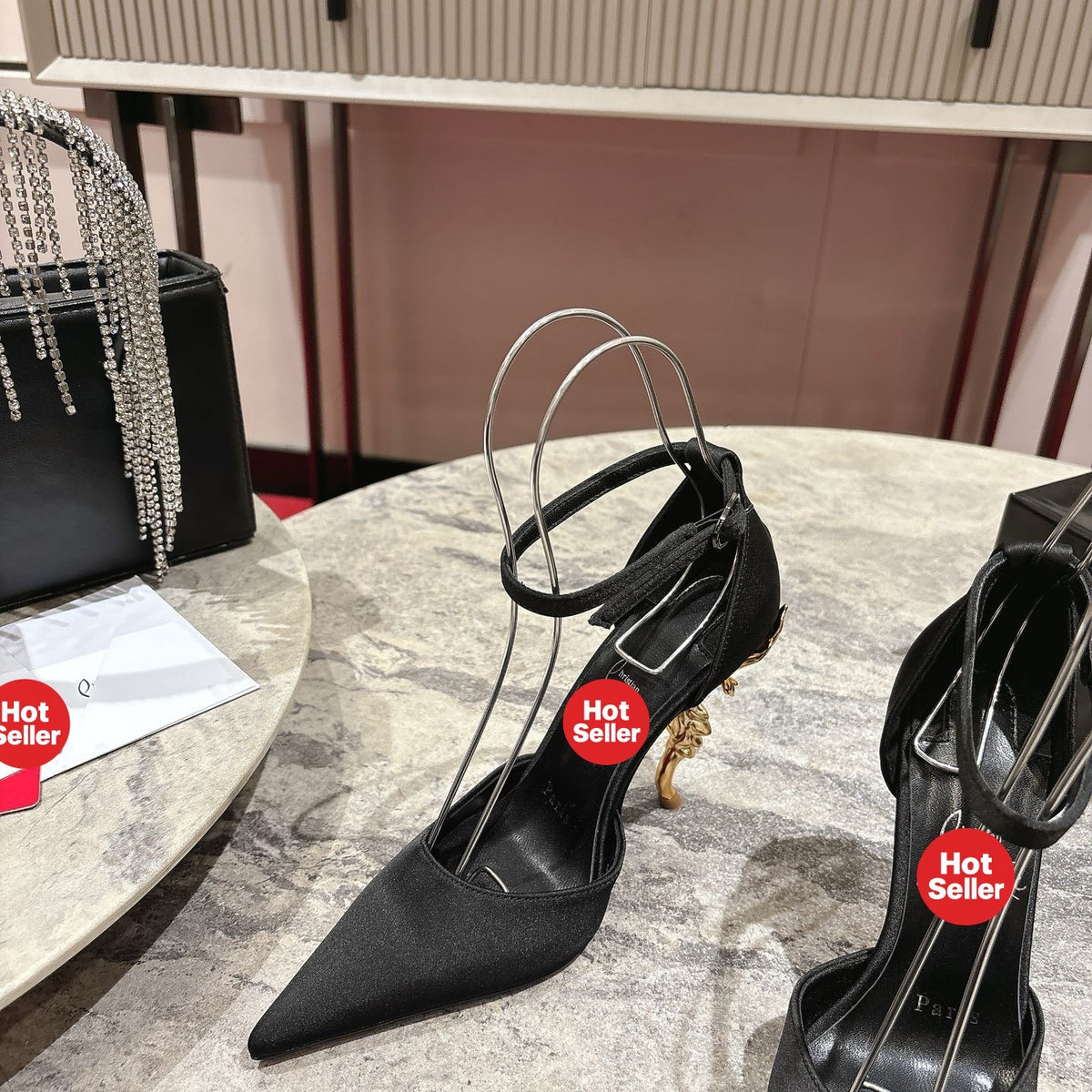 Stylish rose-adorned high heels in faux suede, with a 10cm heel.