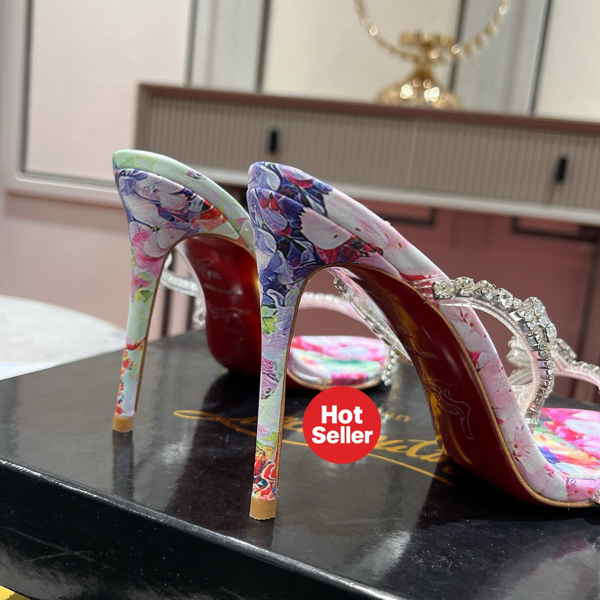 High-heeled mules with a distinctive print; 10cm heel.