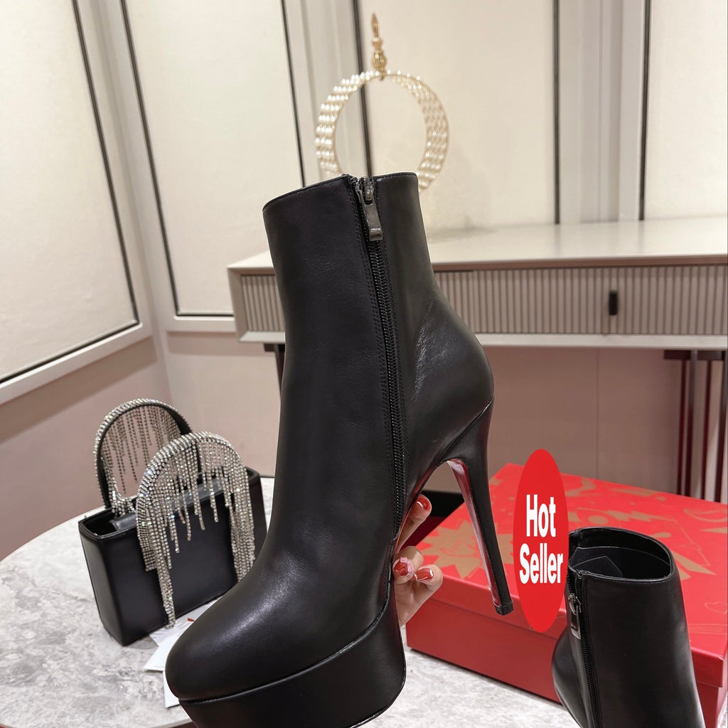 Black Nappa leather ankle boots featuring a soaring 12cm height. Heel: 13cm.