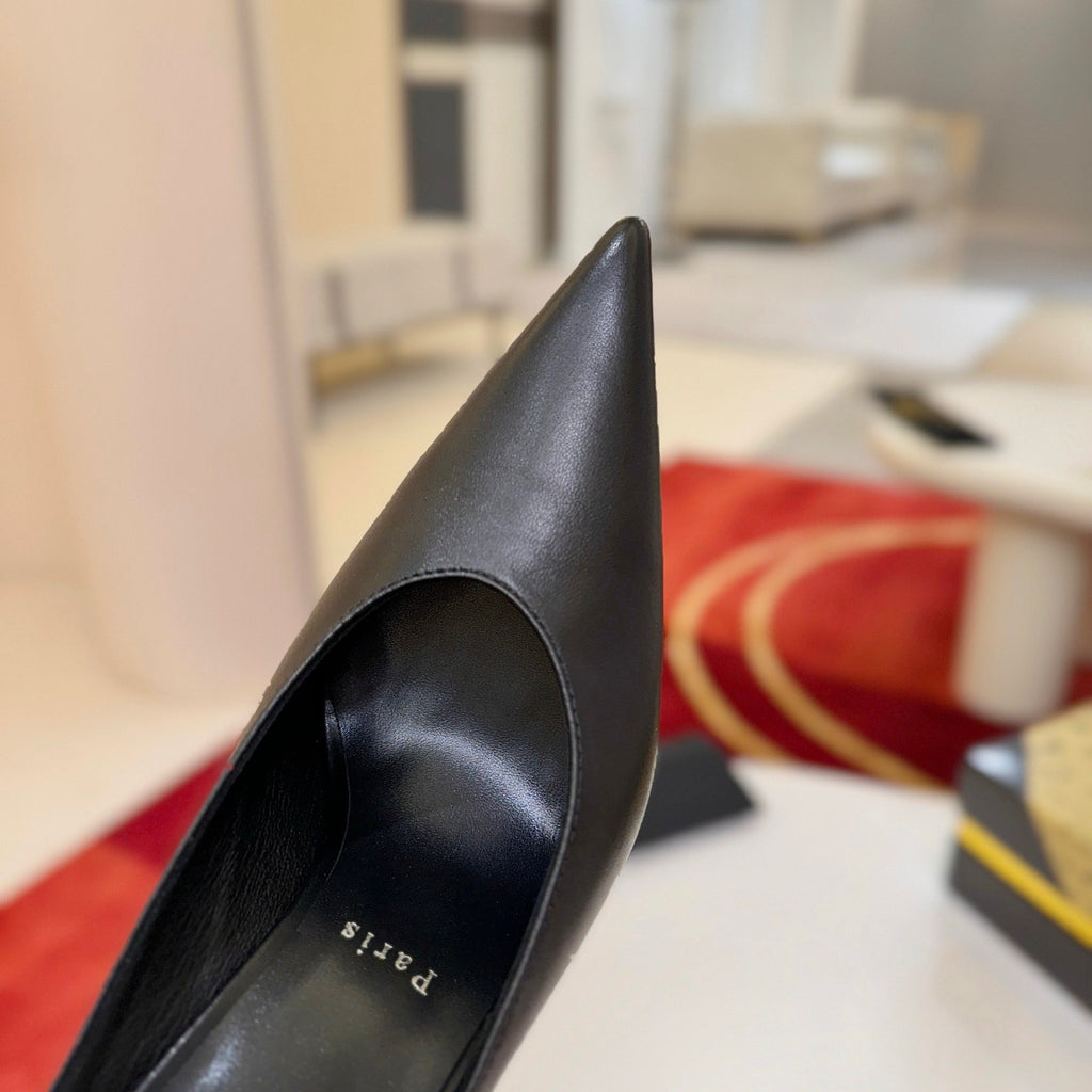 Black cowhide high-heeled mules, 10cm heel.