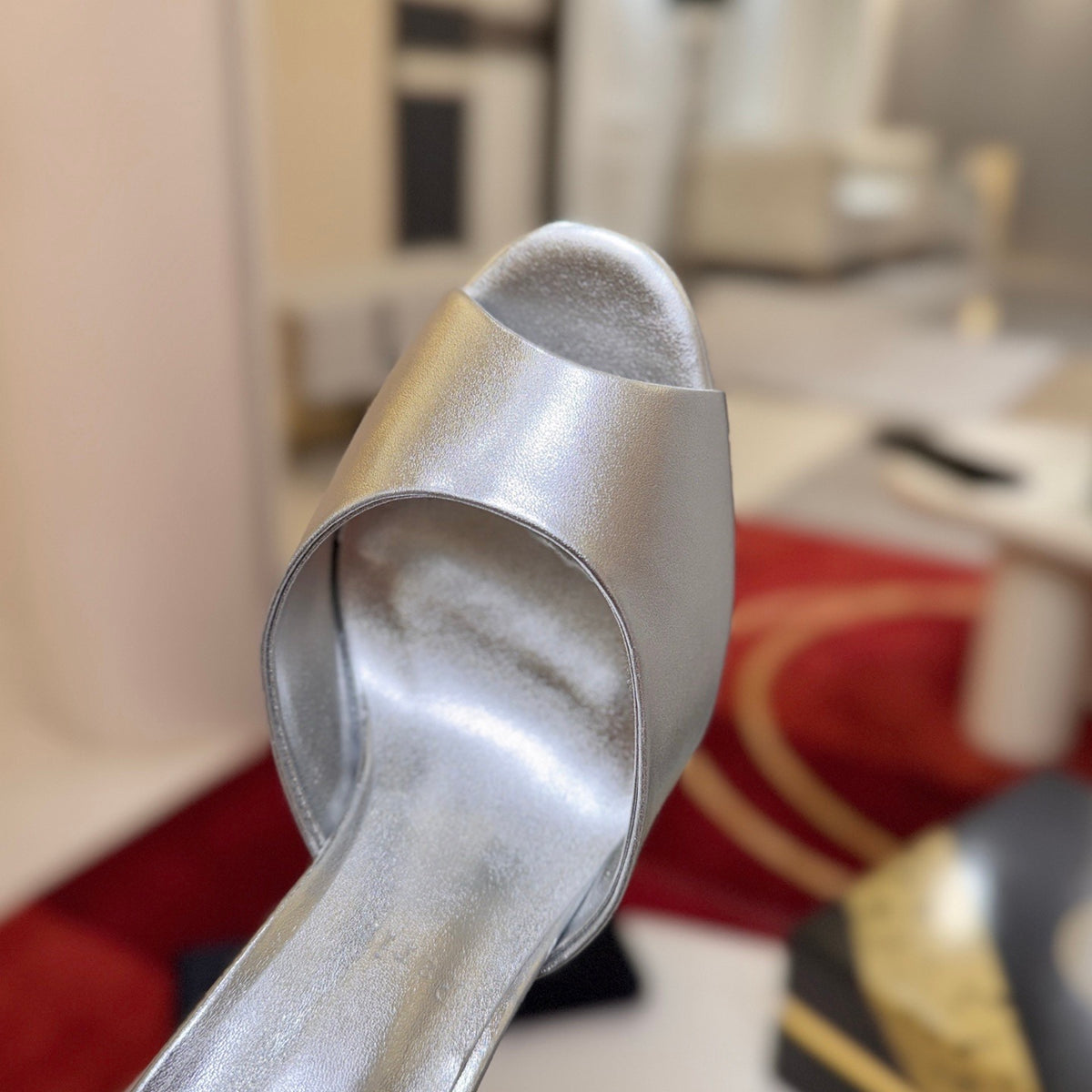 Silver peep-toe high-heeled mules, 10cm heel.