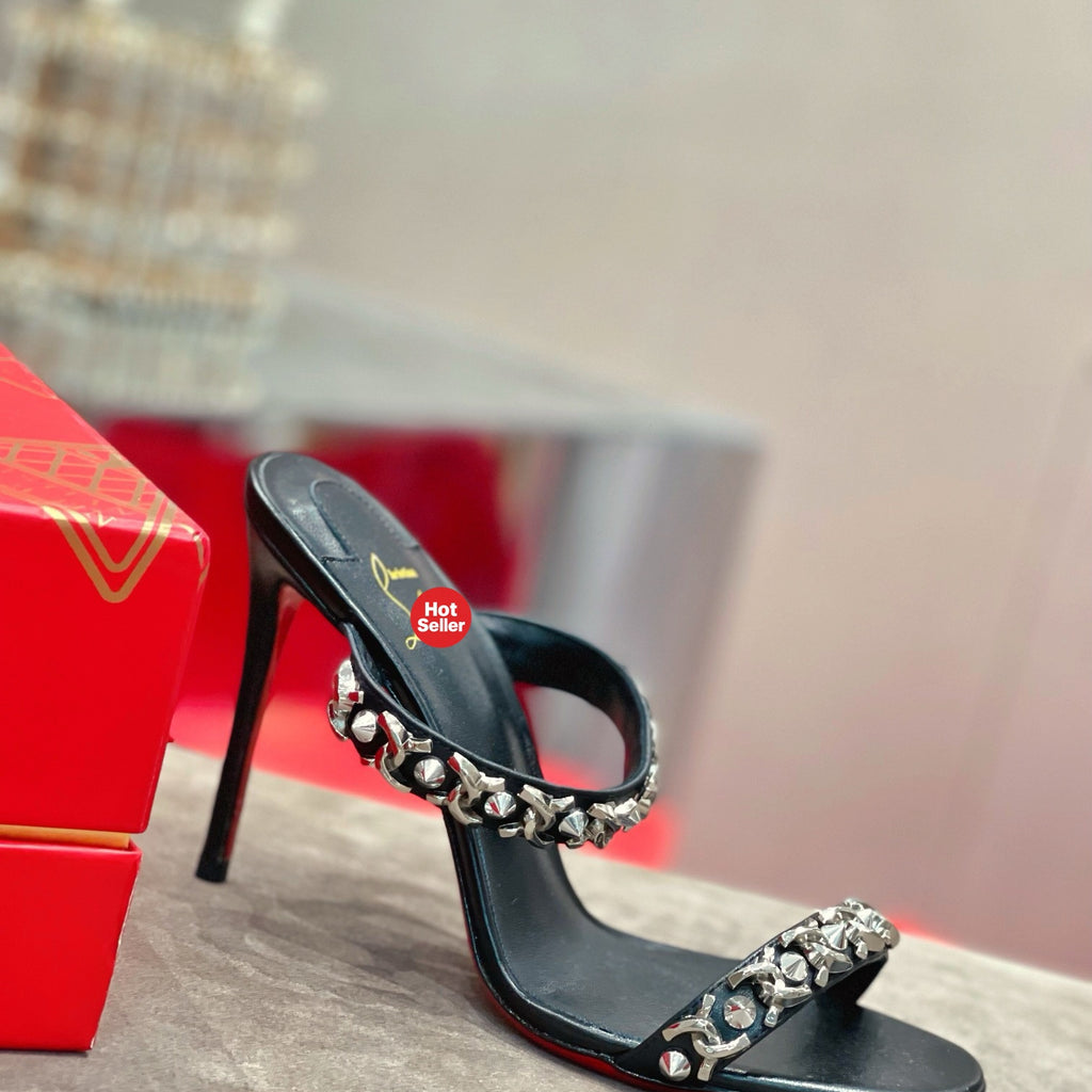 Chain-detail high-heeled mules, 10cm heel.