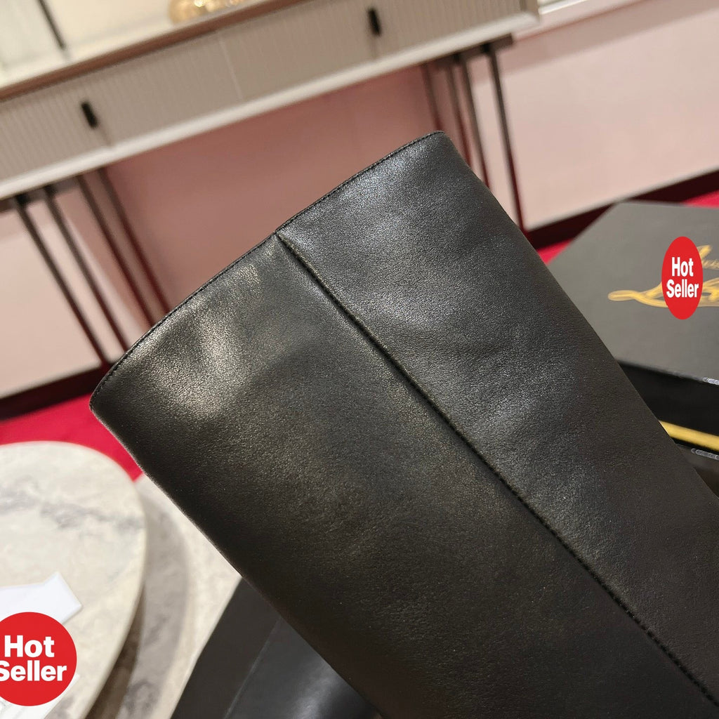 Black leather mid-calf boots, 10cm heel.