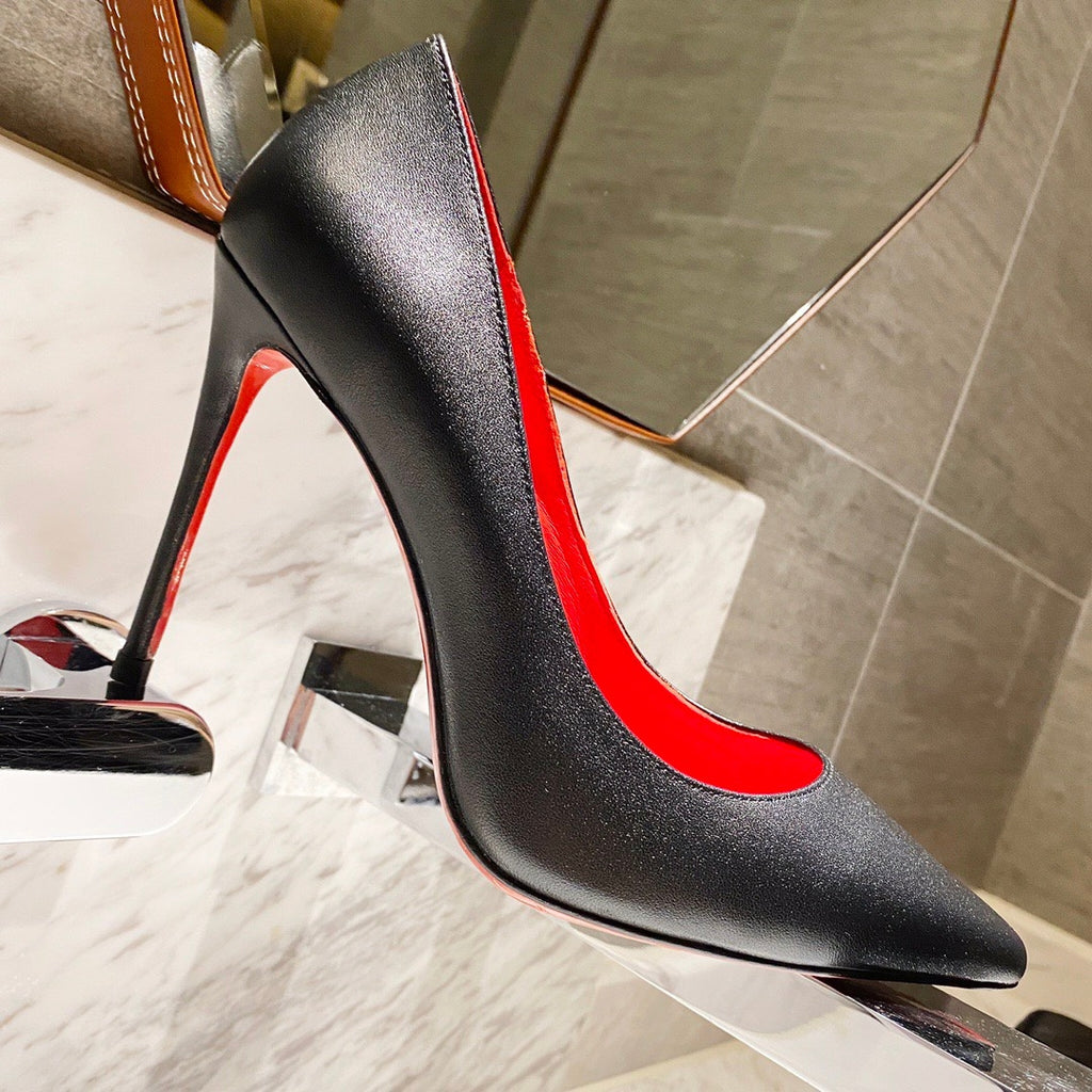 Black leather high heels, 12cm heel.