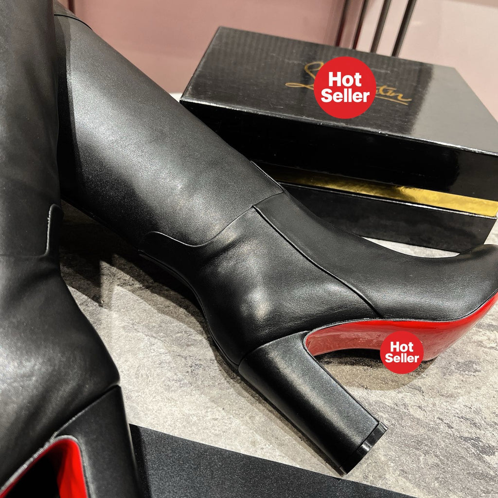 Black leather tall boots, 8.5cm heel.