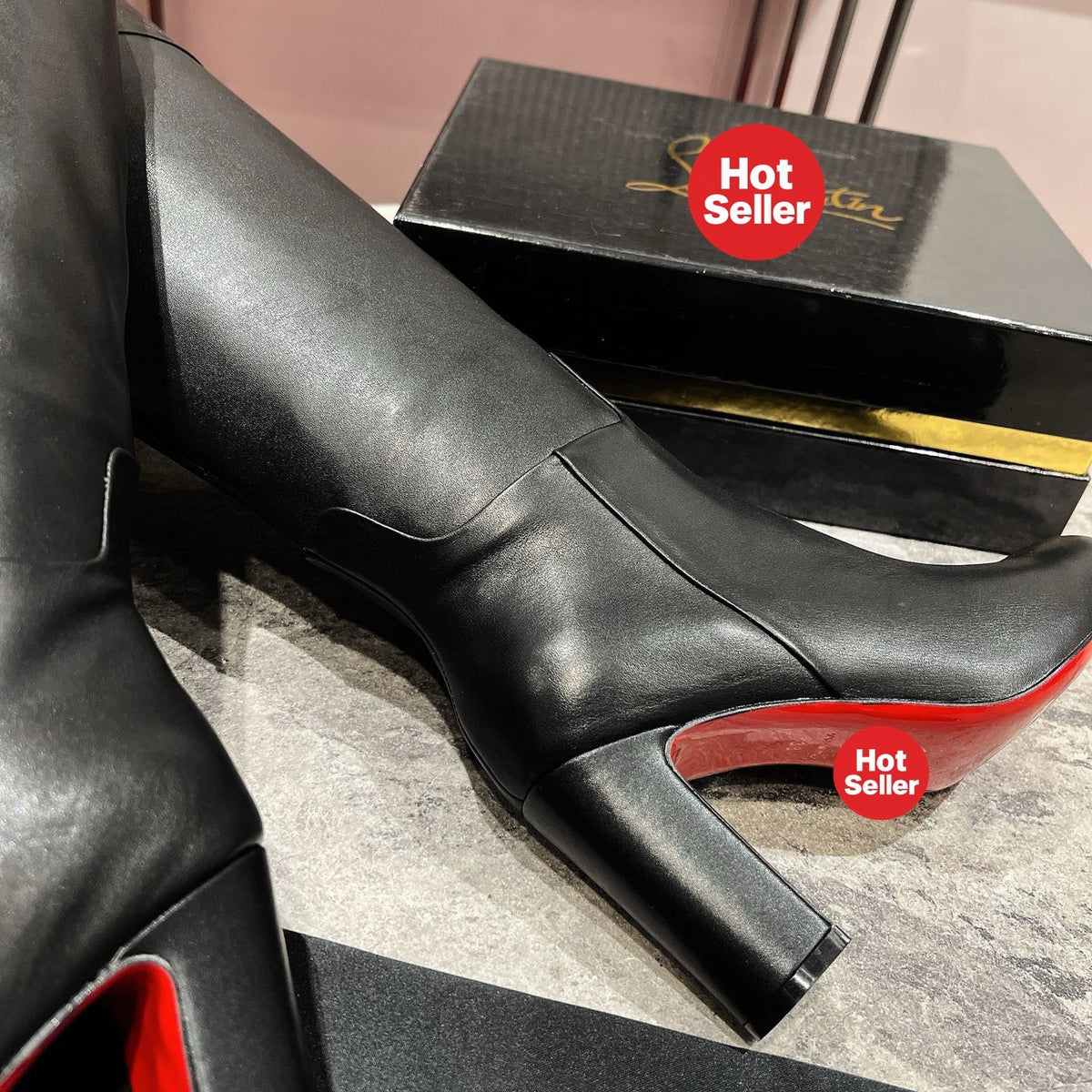 Black leather tall boots, 8.5cm heel.
