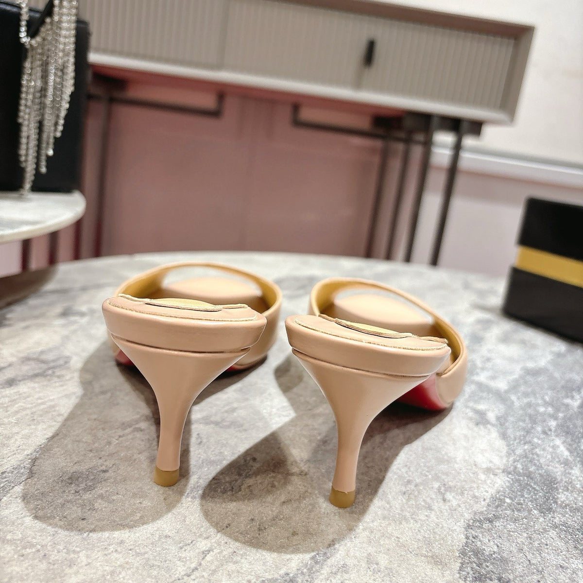 Apricot high-heeled mules, 8.5cm heel.
