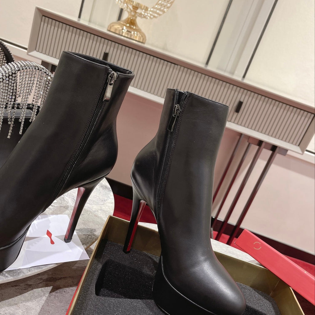 Black Nappa leather ankle boots featuring a soaring 12cm height. Heel: 13cm.