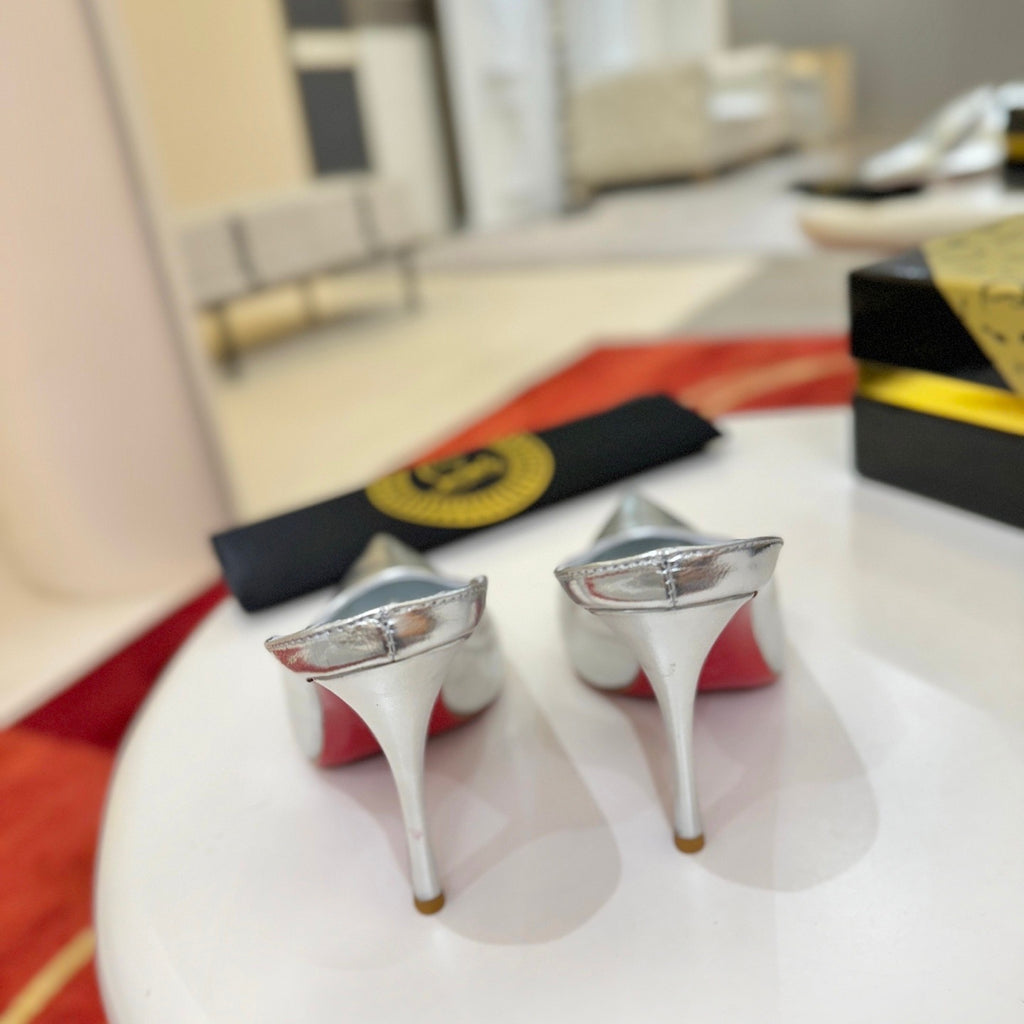 Silver leather high-heeled mules, 10cm heel.