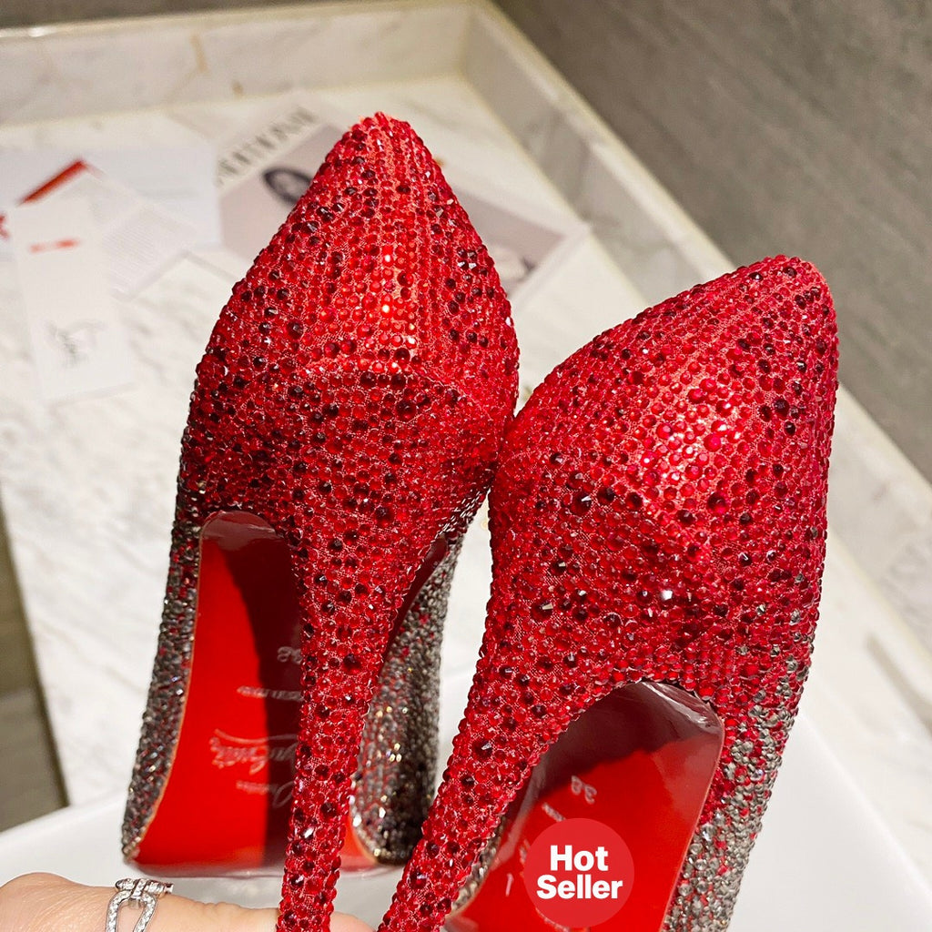 Bright red fully rhinestone-encrusted high heels, 10cm heel.
