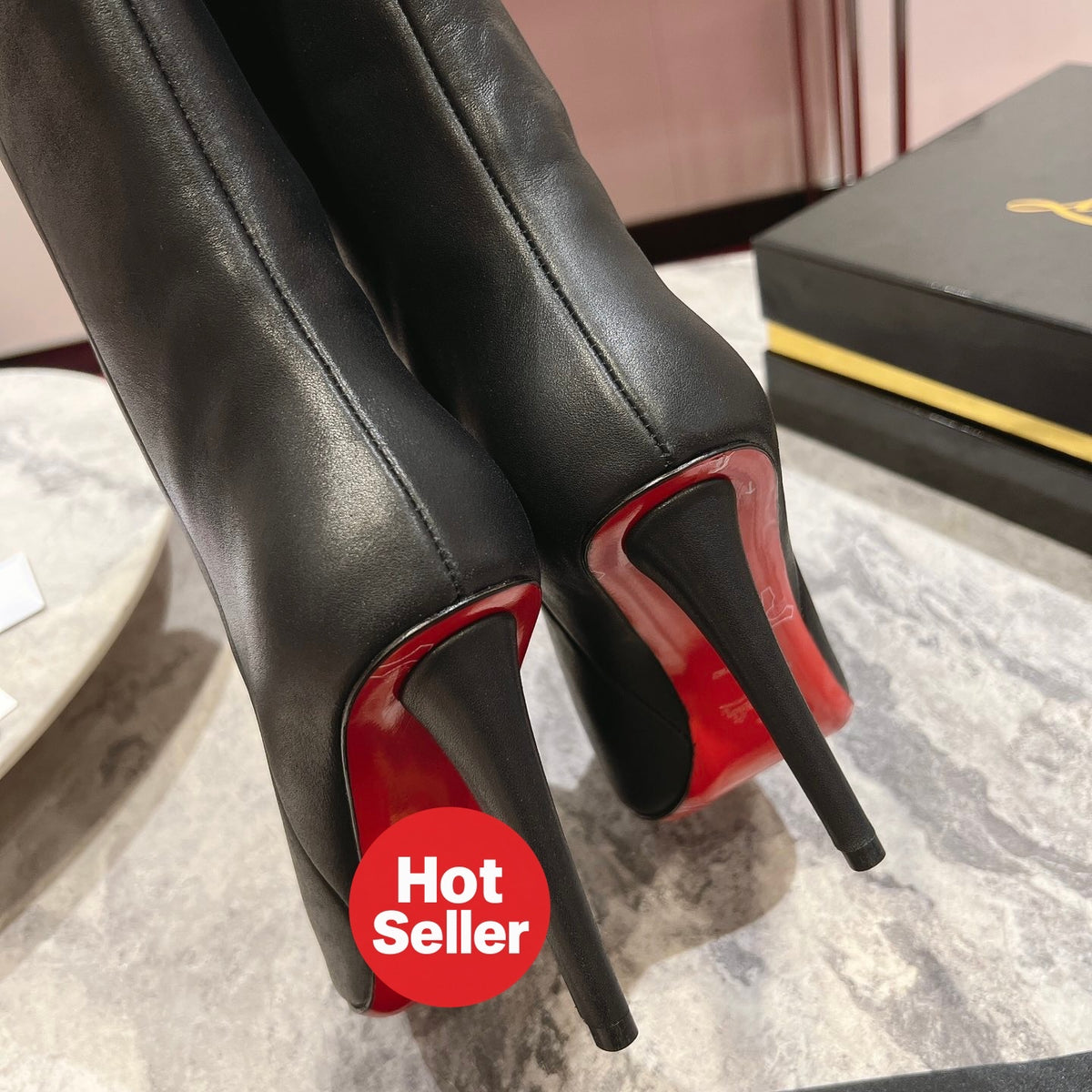 Black leather mid-calf boots, 10cm heel.