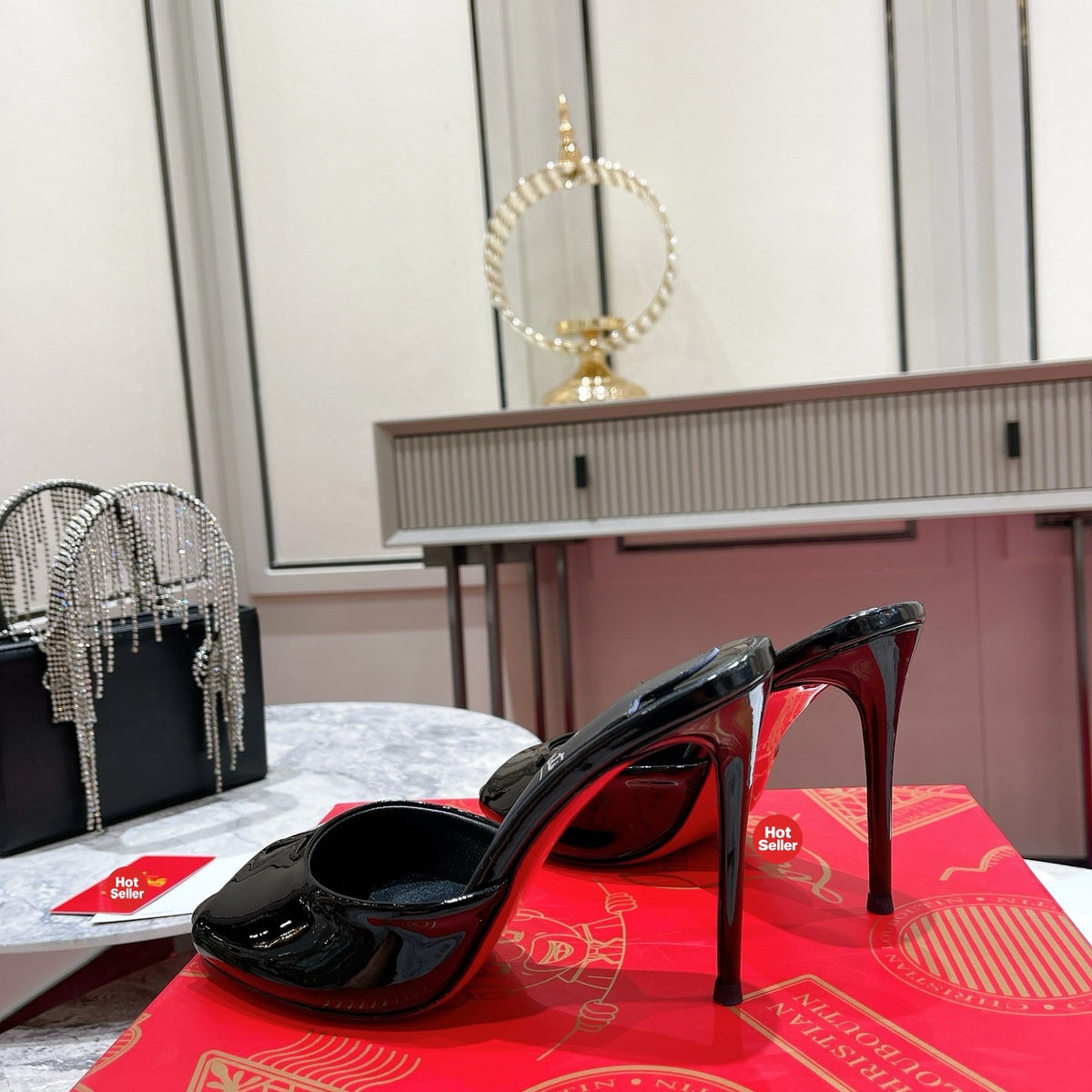 Black patent leather peep-toe high-heeled mules, 10cm heel.