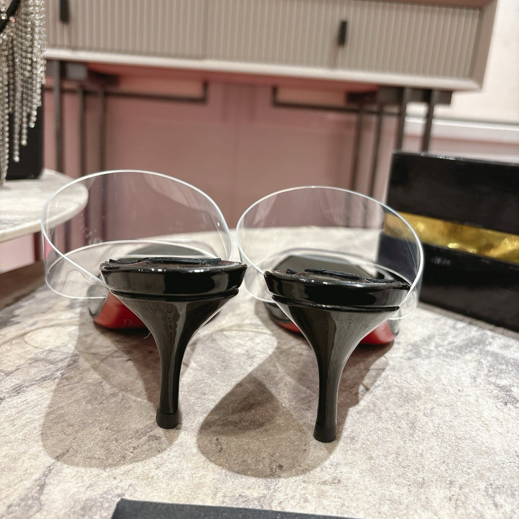 Clear high-heeled mules, 8.5cm heel.