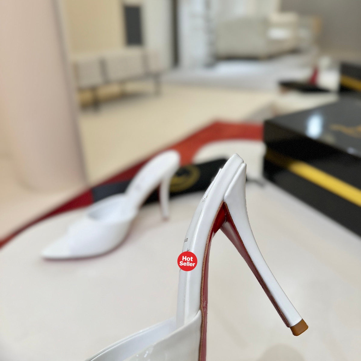 White patent leather pointed-toe high-heeled mules, 10cm heel.