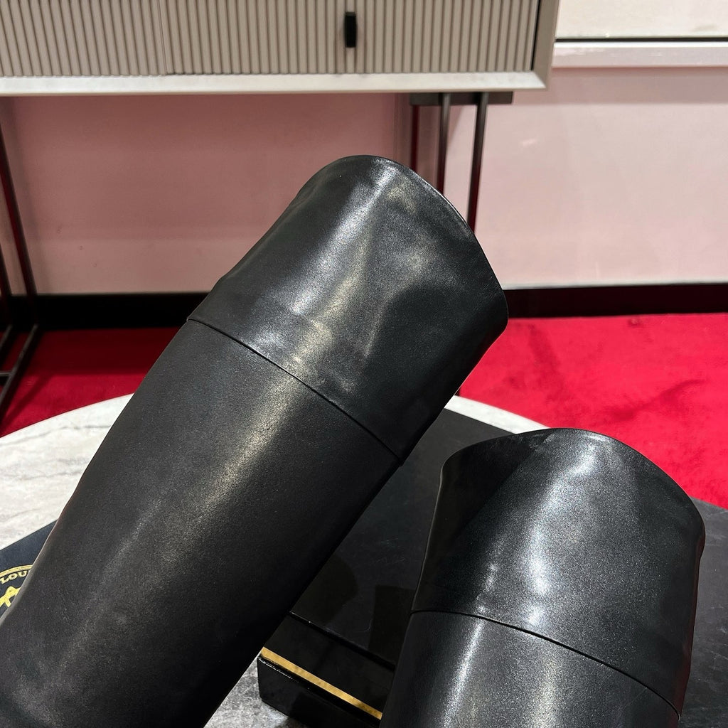 Black leather tall boots, 8.5cm heel.