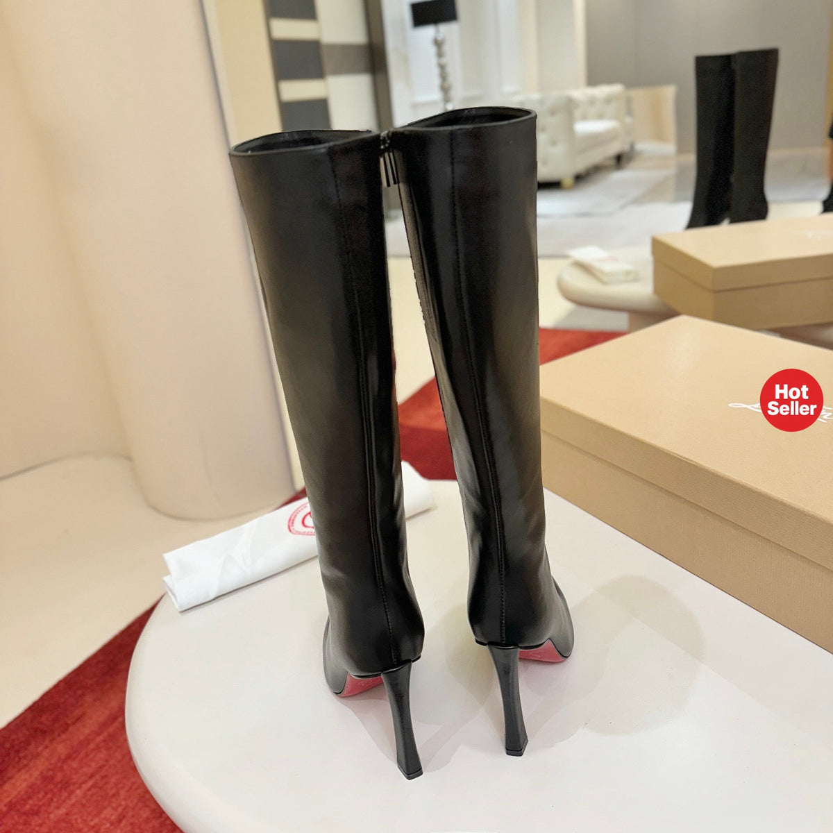Cowhide banana-heel tall boots; 10cm heel.