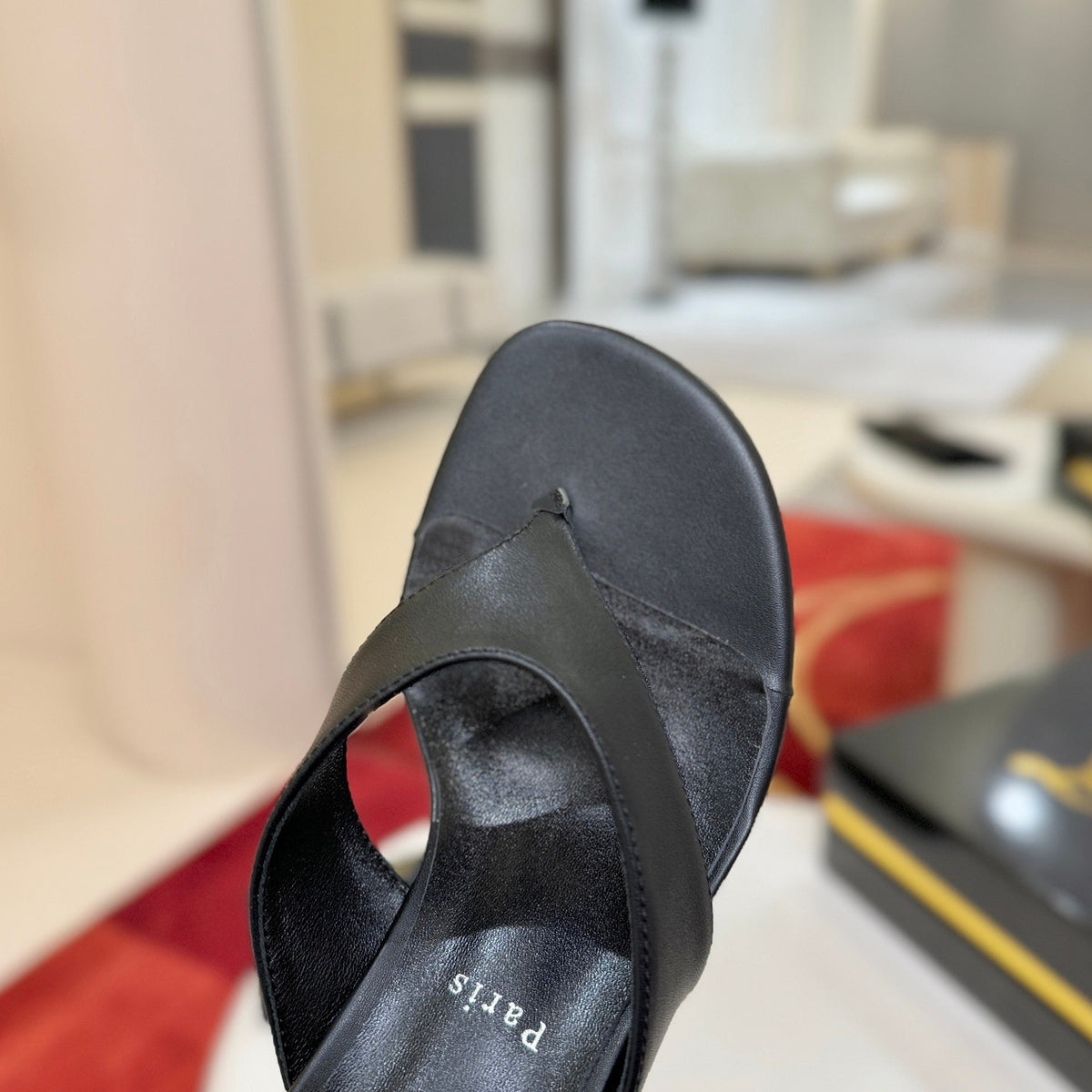 Black flip-flops, 5.5cm heel.