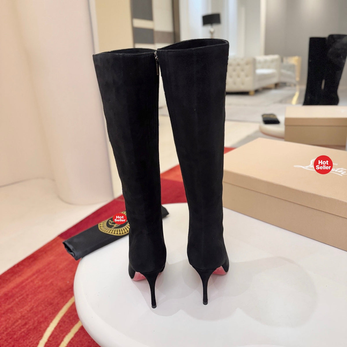 Black calf-hair high-heeled tall boots, 10cm heel.