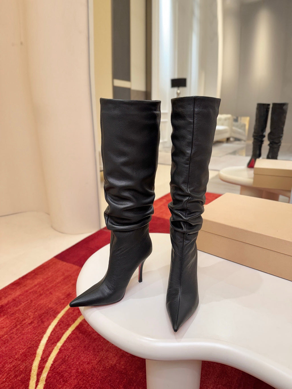 The tapered silhouette creates a refined, modern look. This footwear features a 100mm stiletto heel.