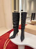 The tapered silhouette creates a refined, modern look. This footwear features a 100mm stiletto heel.