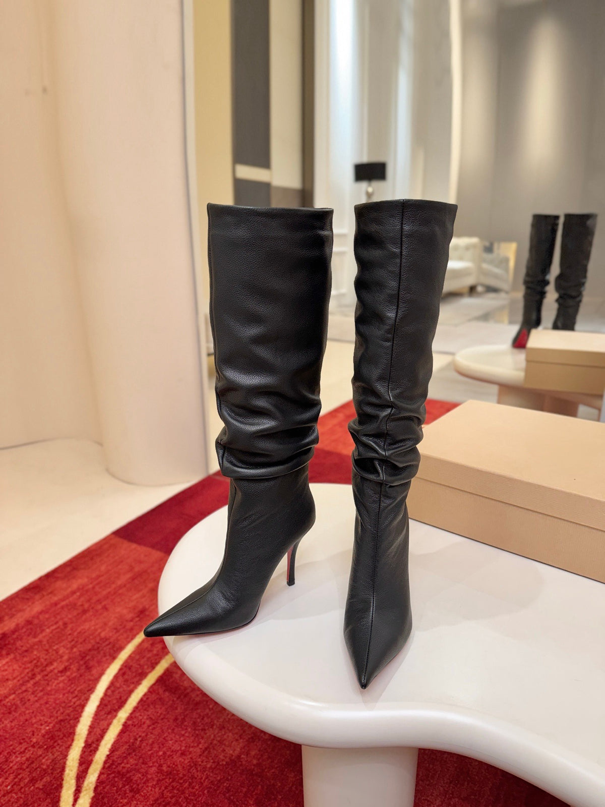 The tapered silhouette creates a refined, modern look. This footwear features a 100mm stiletto heel.