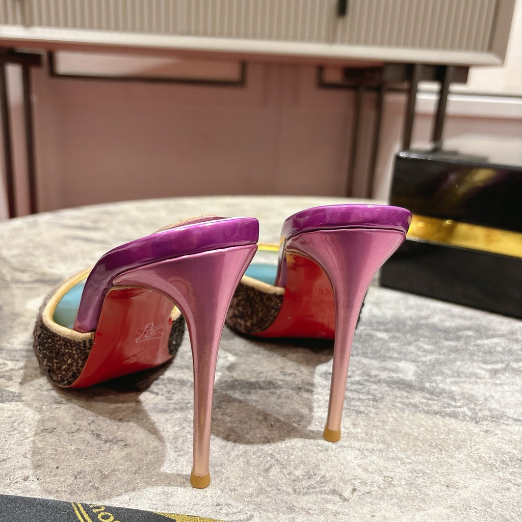 Peep-toe high-heeled slides with colorful rhinestones; 10cm heel.