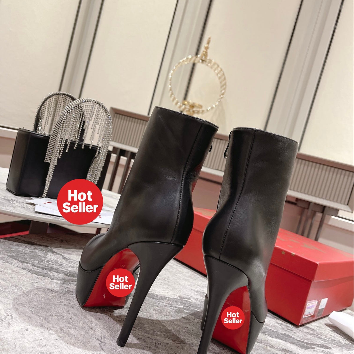 Black Nappa leather ankle boots featuring a soaring 12cm height. Heel: 13cm.