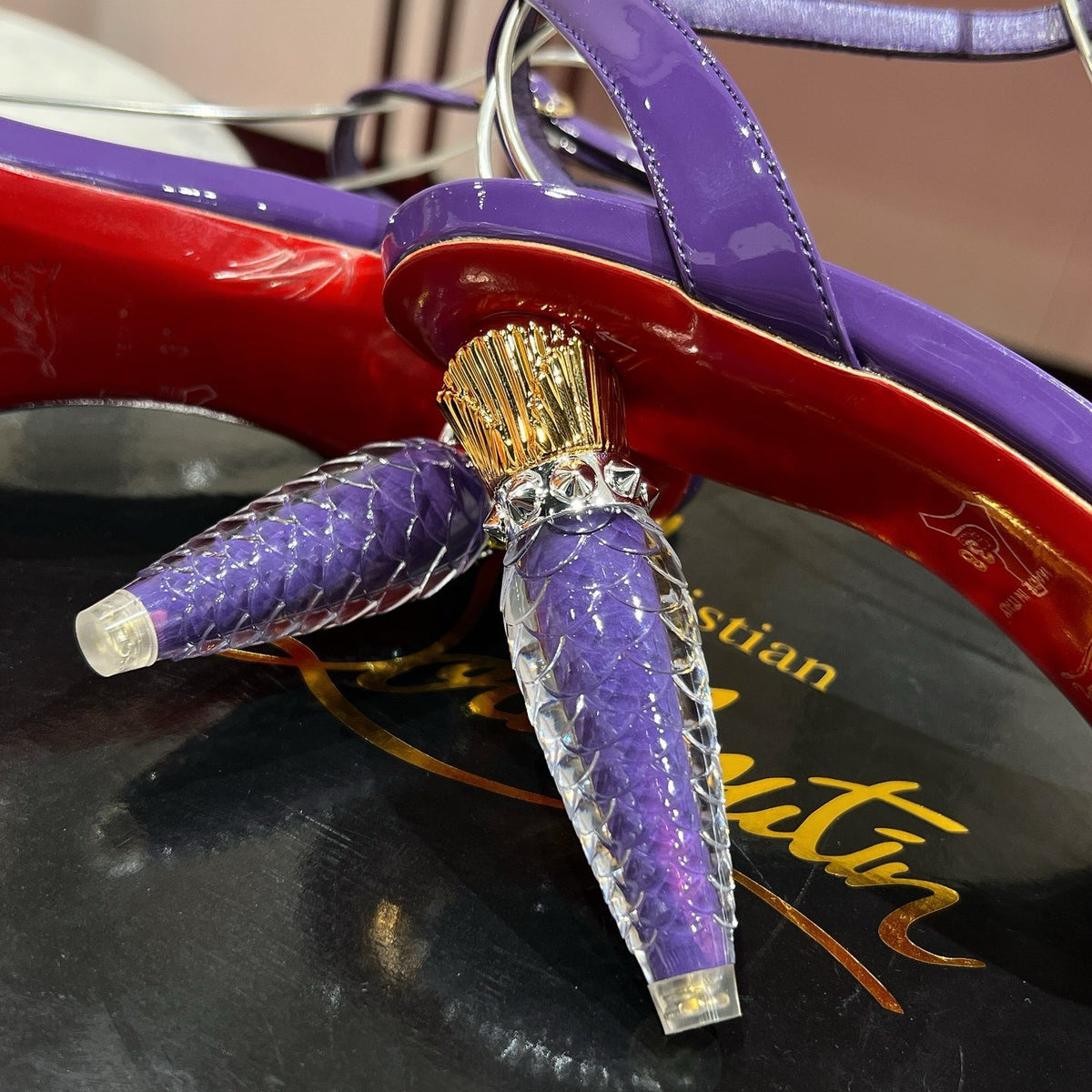 Purple lipstick and high heels with 10cm heels.