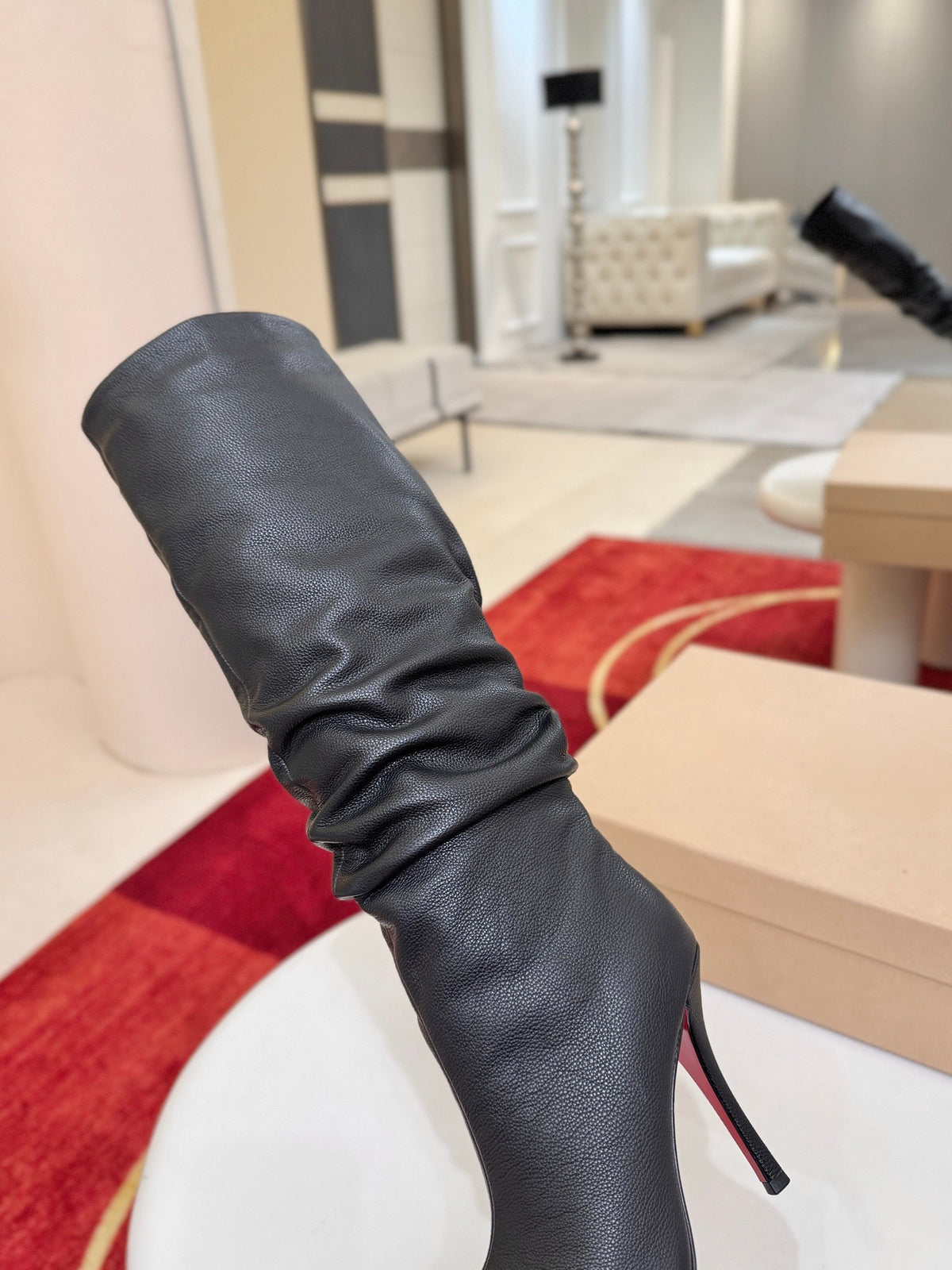 The tapered silhouette creates a refined, modern look. This footwear features a 100mm stiletto heel.